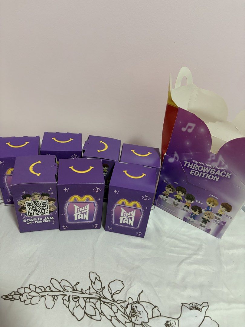 McDonald's TinyTAN Throwback Edition Happy Meal Boxes and Figures (Category: Designer & Blind Box Toys) located in Morong. Submitted by Kaycer00 (Listing ID 1468551958, Image 1). Description: For Take All 3500 nalang 11 pcs no repeat charaters Purple all complete red 4pcs lang total of 11 Last Price posted 350 each min. Of 2 McDonald's TinyTAN Throwback Edition Happy Meal collection - Features iconic purple and red BTS character designs - Include
