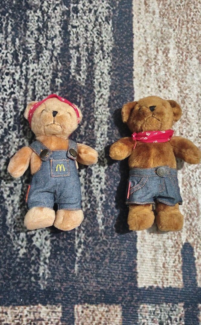 McDonalds Vintage Denim Bears Plush Set (Category: Plushies & Soft Toys) located in Manila. Submitted by ianmontede19006 (Listing ID 1468508751, Image 2). Description: - Set of 2 collectible McDonald's teddy bears with soft brown fur - Bear 1 wears denim overalls with the iconic yellow McDonald's logo - Bear 2 wears denim shorts with a stamped button and branded red tag - Both include stylish red bandanas and removable clothing - Must-have additi