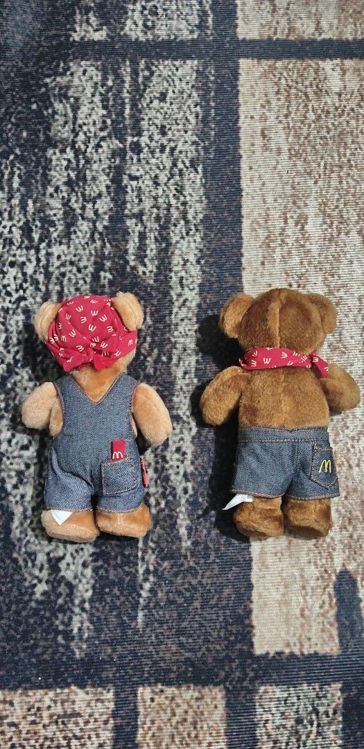 McDonalds Vintage Denim Bears Plush Set (Category: Plushies & Soft Toys) located in Manila. Submitted by ianmontede19006 (Listing ID 1468508751, Image 3). Description: - Set of 2 collectible McDonald's teddy bears with soft brown fur - Bear 1 wears denim overalls with the iconic yellow McDonald's logo - Bear 2 wears denim shorts with a stamped button and branded red tag - Both include stylish red bandanas and removable clothing - Must-have additi