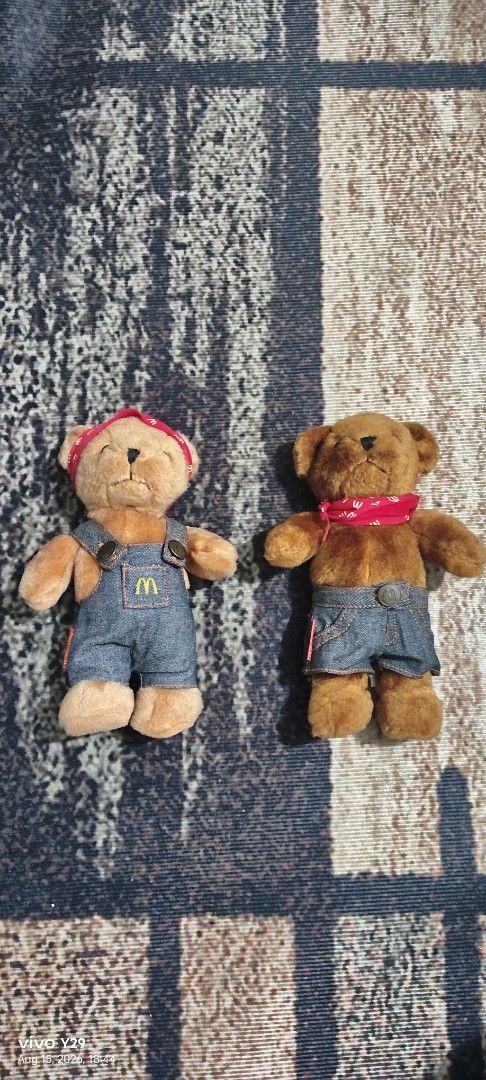 McDonalds Vintage Denim Bears Plush Set (Category: Plushies & Soft Toys) located in Manila. Submitted by ianmontede19006 (Listing ID 1468508751, Image 1). Description: - Set of 2 collectible McDonald's teddy bears with soft brown fur - Bear 1 wears denim overalls with the iconic yellow McDonald's logo - Bear 2 wears denim shorts with a stamped button and branded red tag - Both include stylish red bandanas and removable clothing - Must-have additi