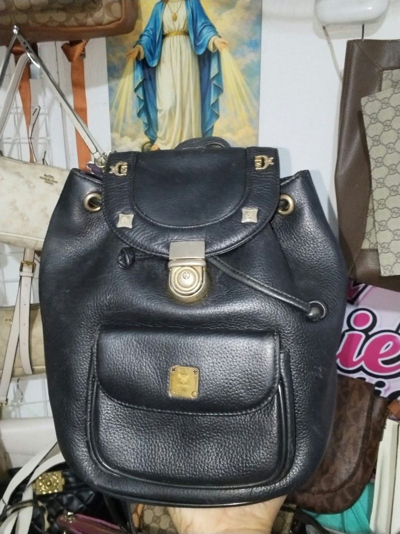 MCM small Backpack (Category: Backpacks) located in Manila. Submitted by bagelyascollection (Listing ID 1468707578, Image 1). Description: A small size backpack MCM black plain design turnable screw issue hardware faded pero walang kalawang.