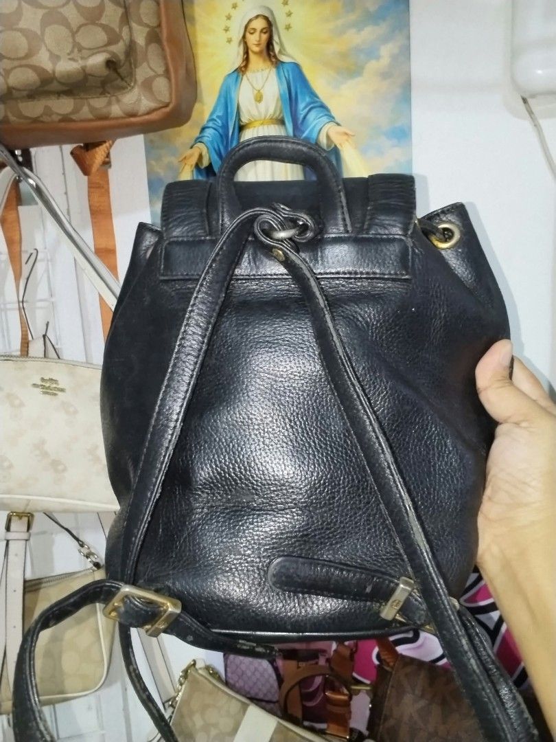 MCM small Backpack (Category: Backpacks) located in Manila. Submitted by bagelyascollection (Listing ID 1468707578, Image 3). Description: A small size backpack MCM black plain design turnable screw issue hardware faded pero walang kalawang.
