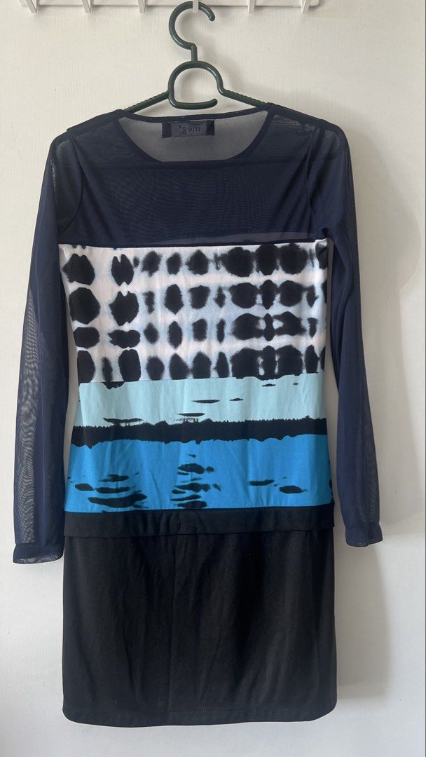 meg* Long Sleeve Multi-Pattern Mesh Dress Size S (Category: Dresses) located in Taguig. Submitted by xkmanzano078817 (Listing ID 1468511045, Image 2). Description: - Brand: Meg* - Size: S (Tag attached) - Design: Long sleeve dress featuring a dark sheer mesh top with blue, black, and white tie-dye and horizontal stripes, with a solid black skirt - Neckline: Crew neckline Stretchable.