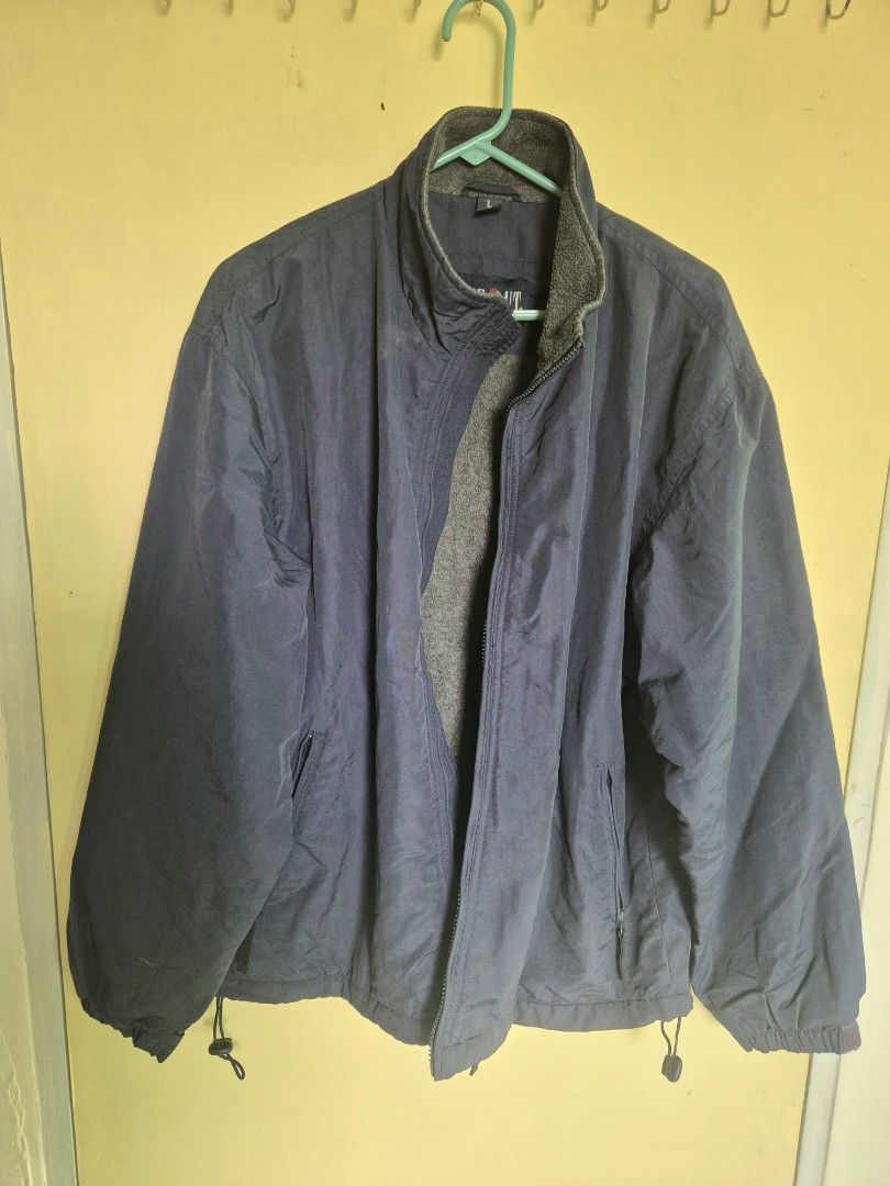 Men's Winter Jacket With Drawstring Hem (Category: Coats, Jackets and Outerwear) located in Bacoor. Submitted by declutternow715 (Listing ID 1468557457, Image 1). Description: - Color: Dark navy blue (solid) - Style: High collar to block the wind - Fit: Drawstring adjusters at the bottom hem and fitted cuffs - Men size - see pics for measurement - perfect for winter / cold weather rfs - decluttering winter clothes.