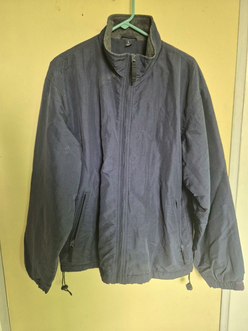 Men's Winter Jacket With Drawstring Hem (Category: Coats, Jackets and Outerwear) located in Bacoor. Submitted by declutternow715 (Listing ID 1468557457, Image 2). Description: - Color: Dark navy blue (solid) - Style: High collar to block the wind - Fit: Drawstring adjusters at the bottom hem and fitted cuffs - Men size - see pics for measurement - perfect for winter / cold weather rfs - decluttering winter clothes.