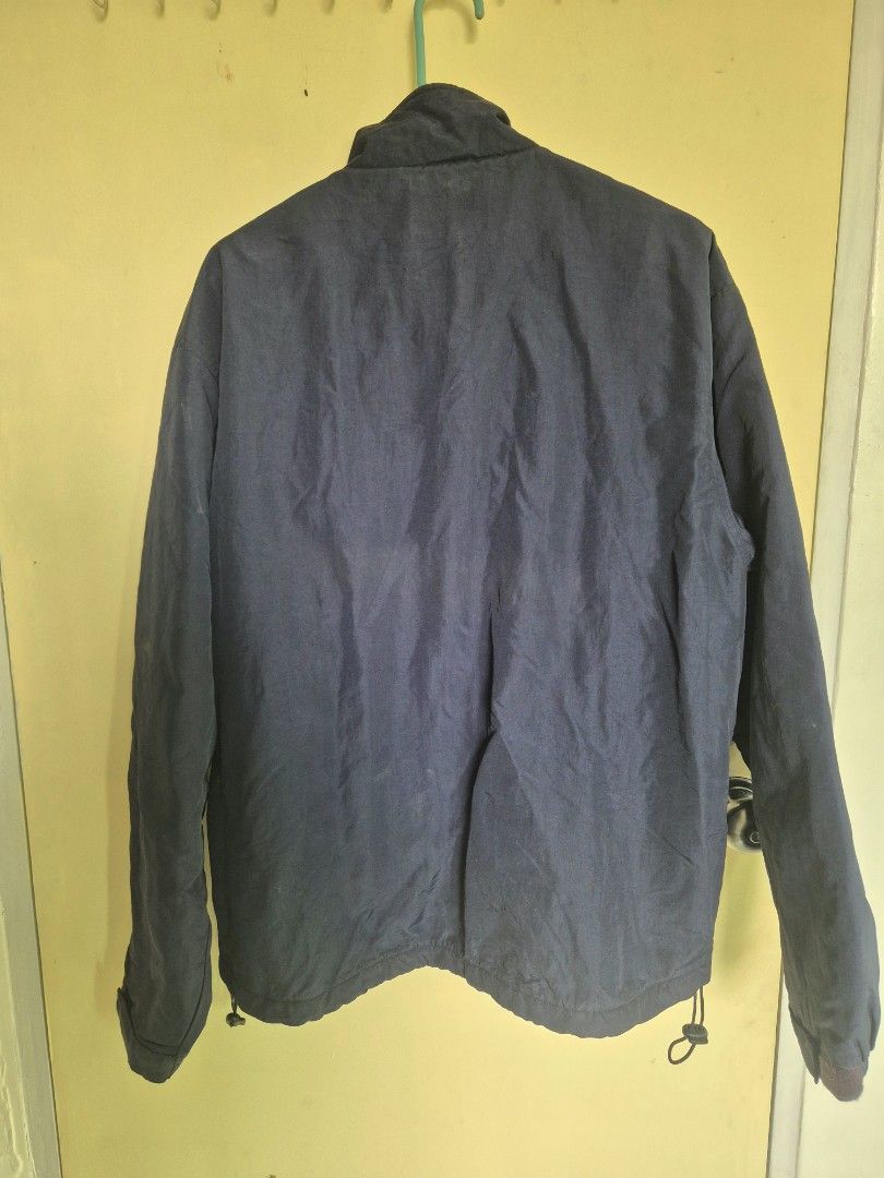 Men's Winter Jacket With Drawstring Hem (Category: Coats, Jackets and Outerwear) located in Bacoor. Submitted by declutternow715 (Listing ID 1468557457, Image 3). Description: - Color: Dark navy blue (solid) - Style: High collar to block the wind - Fit: Drawstring adjusters at the bottom hem and fitted cuffs - Men size - see pics for measurement - perfect for winter / cold weather rfs - decluttering winter clothes.
