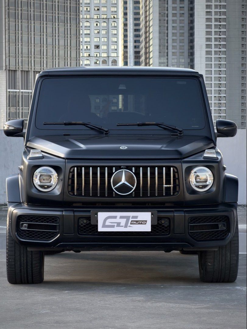 Mercedes-Benz G63 AMG Auto (Category: Used Cars) located in Pasig City. Submitted by gtautoph (Listing ID 1468563243, Image 1). Description: 2021 Mercedes Benz G63 AMG AMG Night Package 22k Kilometers ONLY Matte Black Full Body Wrap (Black Metallic Original Color) 4.0L V8 Biturbo AMG Petrol Engine 577 HP 850 Nm of Torque AMG SPEEDSHIFT TCT 9-Speed Automatic Transmission Diamond Stitched Red Leather Interior Ventilated Seats 12” Digital Instrument