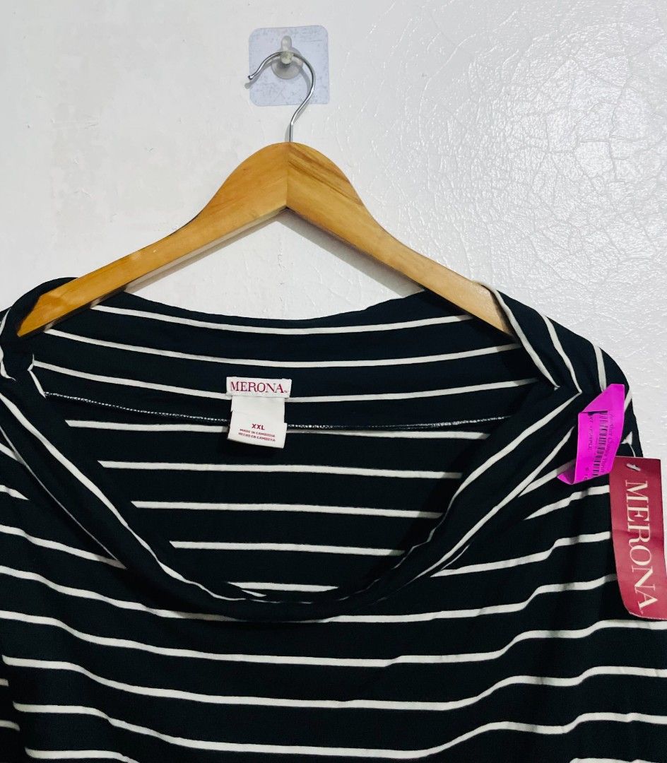 Merona skirt (Category: Blouses) located in San Mateo. Submitted by safeearth21 (Listing ID 1468678461, Image 3). Description: - Brand: Merona - Size: XXL (marked on inner collar) - Color/Pattern: Black and white horizontal stripes - Style: Cowl neckline with a relaxed fit - Condition: Brand new with side tag attached - Origin: Made in Cambodia.