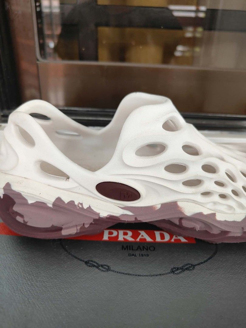 Merrell Hydro Moc White Burgundy Floral Clogs (Category: Slippers and slides) located in Plaridel. Submitted by jkauthentics (Listing ID 1468536193, Image 2). Description: - Brand/Model: Merrell Hydro Moc slip-on clogs - Colorway: White upper with burgundy and pink floral paint splatter print - Size: US 6, UK 4, EUR 37 - Features: Lightweight foam build, all-over ventilation holes, branded heel strap, and molded arch support - Condition: Worn a f