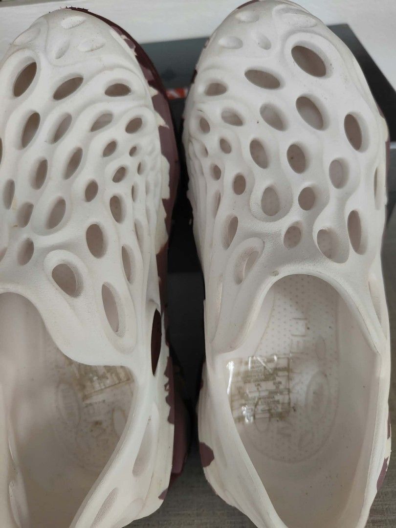 Merrell Hydro Moc White Burgundy Floral Clogs (Category: Slippers and slides) located in Plaridel. Submitted by jkauthentics (Listing ID 1468536193, Image 3). Description: - Brand/Model: Merrell Hydro Moc slip-on clogs - Colorway: White upper with burgundy and pink floral paint splatter print - Size: US 6, UK 4, EUR 37 - Features: Lightweight foam build, all-over ventilation holes, branded heel strap, and molded arch support - Condition: Worn a f
