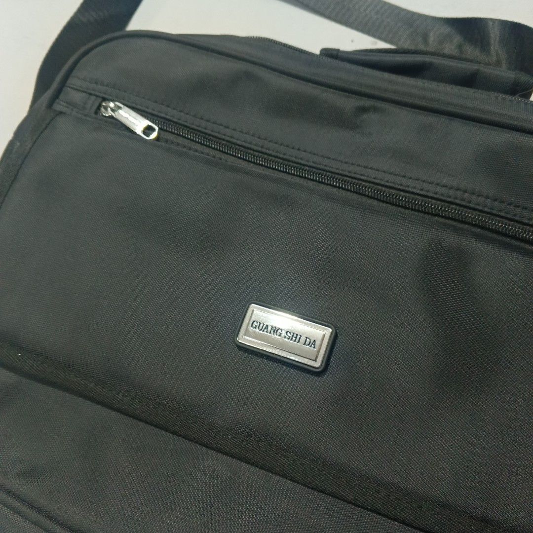 Messenger Bag (Category: Sling Bags) located in Pili. Submitted by jevin_ukay (Listing ID 1468653321, Image 2). Description: Brand new Condition Width: 16 Length: 12 No flaws Location Bicol.
