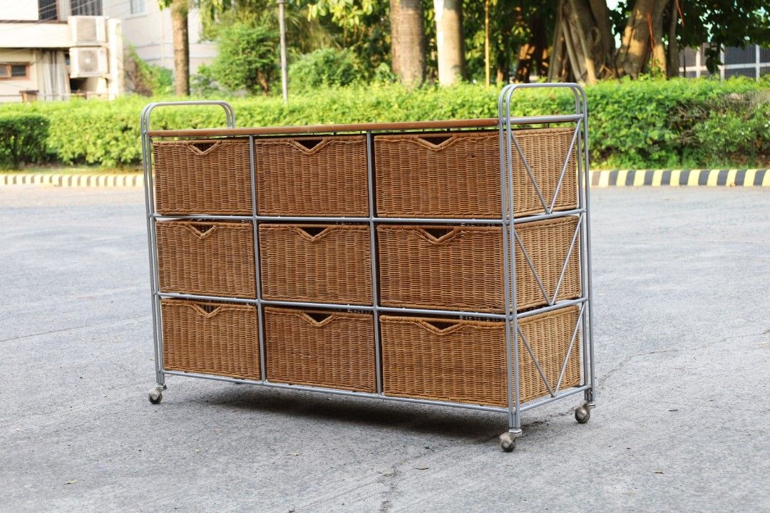 Metal frame woven rattan drawers on caster (Category: Storage Boxes & Baskets) located in Guiguinto. Submitted by eypee_knows (Listing ID 1468659321, Image 3). Description: Metal frame woven rattan drawers on caster *Has minor dents & tear on wooden top but overall in great condition Dimensions: L- 48 W- 14 H- 30 inches Basket- 14.5x13x7.5 inches price: 7,500 each shop loc: green estates tiaong guiguinto bulacan we do ship thru lalamove & drop & 