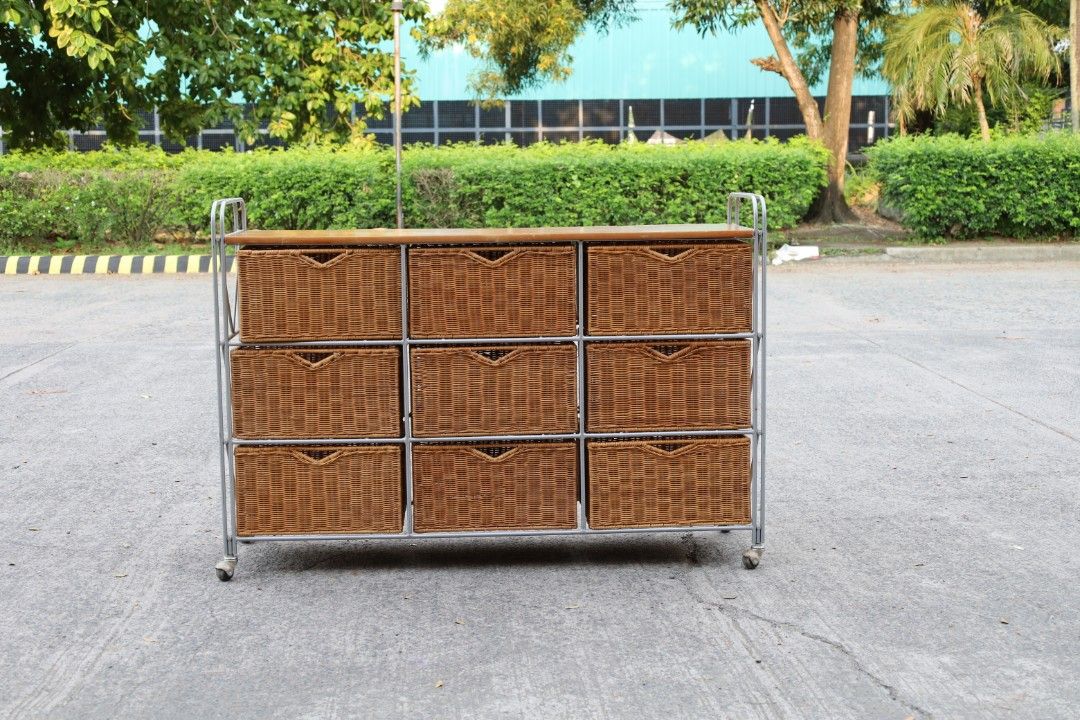 Metal frame woven rattan drawers on caster (Category: Storage Boxes & Baskets) located in Guiguinto. Submitted by eypee_knows (Listing ID 1468659321, Image 2). Description: Metal frame woven rattan drawers on caster *Has minor dents & tear on wooden top but overall in great condition Dimensions: L- 48 W- 14 H- 30 inches Basket- 14.5x13x7.5 inches price: 7,500 each shop loc: green estates tiaong guiguinto bulacan we do ship thru lalamove & drop & 