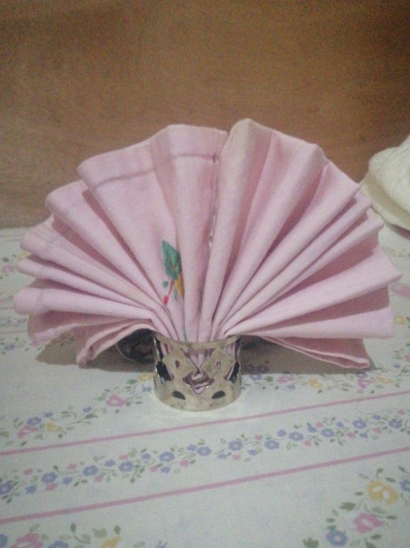 Metal Napkin Holders (Category: Towels, Napkins & Holders) located in Manila. Submitted by ceroma (Listing ID 1451013227, Image 1). Description: 10 pieces available, retro 50 each, rare, with inscriptions I can hardly read, brought from the M.E. 36 yrs ago, never used, but they are older than I know,.
