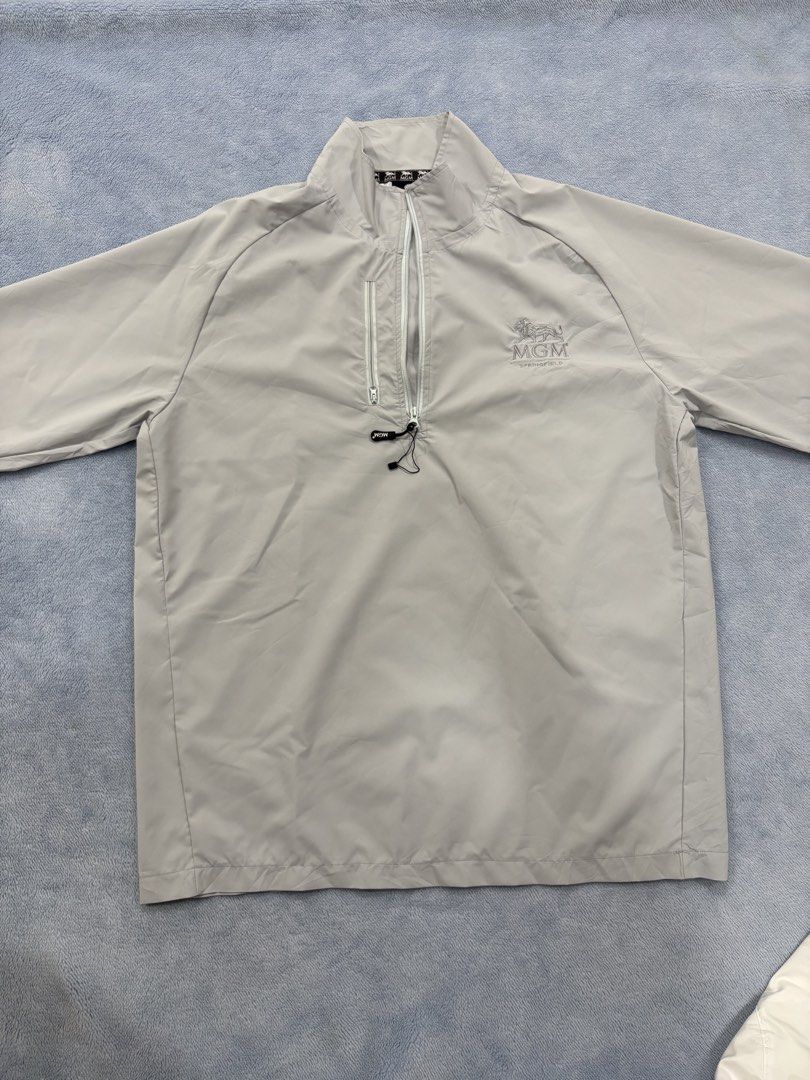 MGM SPRINGFIELD HALF-ZIP PULLOVER (Category: Coats, Jackets and Outerwear) located in Alburquerque. Submitted by ukay_ni_edgar (Listing ID 1468572202, Image 1). Description: Minimalist vintage style with a clean, neutral aesthetic. This light grey MGM Springfield pullover features embroidered branding, a stand-up collar, and a sleek half-zip design — perfect for effortless everyday fits..
