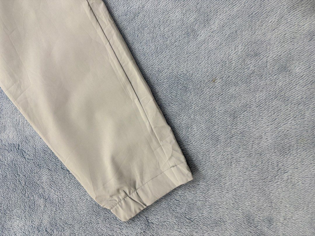 MGM SPRINGFIELD HALF-ZIP PULLOVER (Category: Coats, Jackets and Outerwear) located in Alburquerque. Submitted by ukay_ni_edgar (Listing ID 1468572202, Image 2). Description: Minimalist vintage style with a clean, neutral aesthetic. This light grey MGM Springfield pullover features embroidered branding, a stand-up collar, and a sleek half-zip design — perfect for effortless everyday fits..