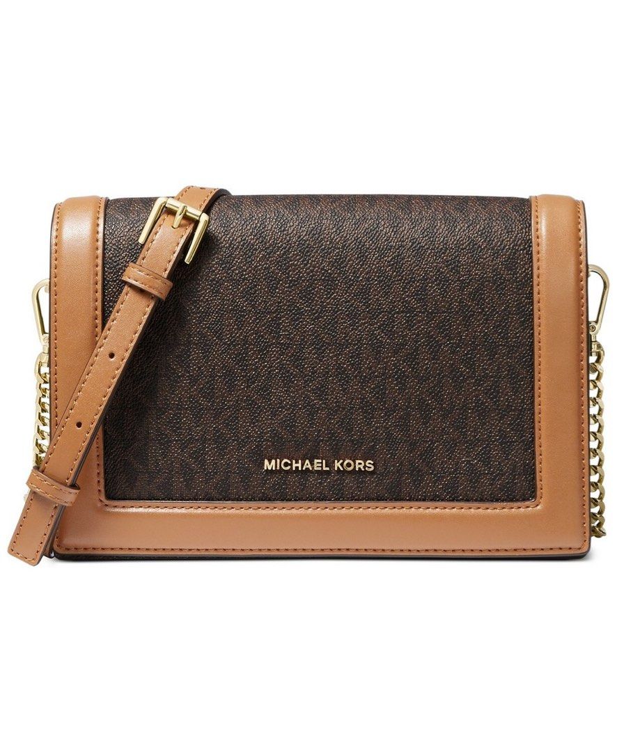 Michael Kors Brown Monogram Crossbody Bag (Category: Luxury Bags & Wallets) located in Manila. Submitted by zianreyy (Listing ID 1468529233, Image 1). Description: - Authentic Michael Kors crossbody bag - Includes an adjustable leather shoulder strap for a custom fit - Used once, perfect condition no issues location: Taguig / Caloocan reason for selling: im not using it anymore, decluttering .