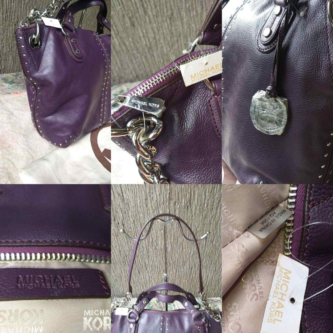 Michael kors crossbody bag (Category: Cross-body Bags) located in Manila. Submitted by onlinesmartshopping12 (Listing ID 1468500595, Image 3). Description: Authentic Michael Kors handbag in a rich purple color. Features silver-tone hardware, including a chain strap and studded accents. Includes a dust bag and Michael Kors shopping bag. The bag has a top zipper closure and a leather tag with the Michael Kors logo inside. The bag has a detachable s
