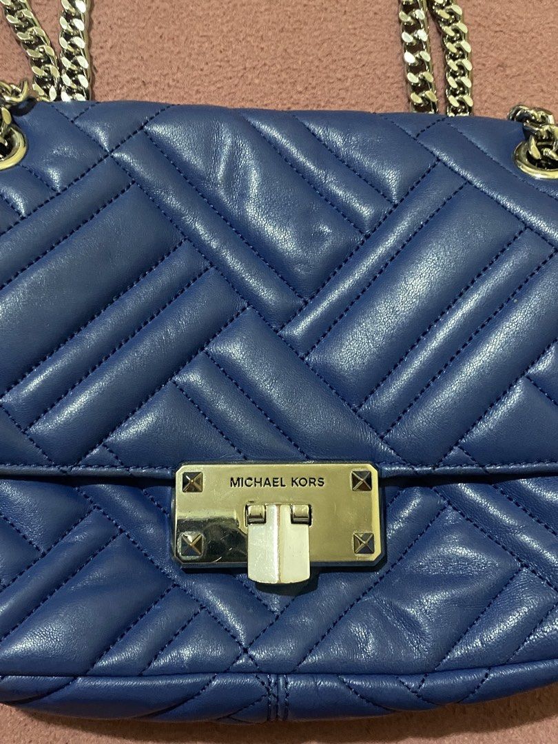 Micheal Kors Bag in Blue Silver Hardware (Category: Shoulder Bags) located in Quezon City. Submitted by luckyg4l (Listing ID 1468647143, Image 2). Description: negotiable authentic .