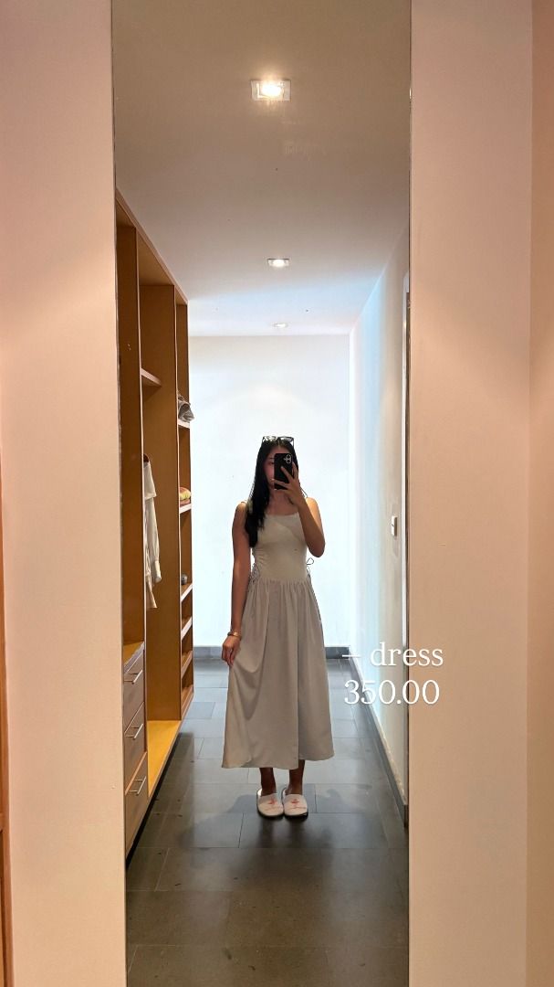 Midi Dress (Category: Dresses) located in Caloocan City. Submitted by styledbyjelein (Listing ID 1468521105, Image 1). Description: Midi dress in soft grey. Spaghetti straps with tie details at the sides. Flared skirt silhouette, hits below the knee. Easy to wear for casual days or weekend outings. Fits true to size, great addition to your wardrobe..