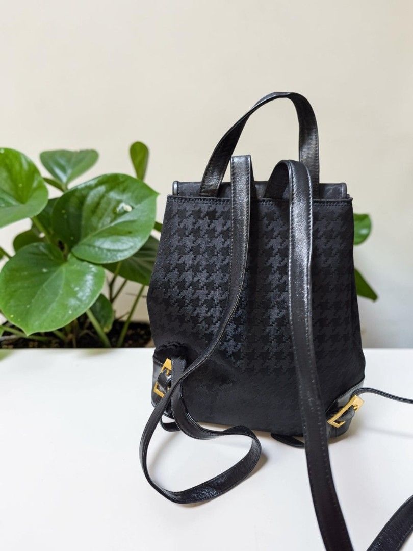 MILA SCHÖN HOUNDSTOOTH NYLON BACKPACK (Category: Backpacks) located in Las Pinas. Submitted by annachiaonair2037 (Listing ID 1468657103, Image 2). Description: MILA SCHÖN HOUDSTOOTH NYLON BACKPACK FROM JAPAN NYLON WITH LEATHER TRIM MAGNETIC LOCK CLOSURE WITH SNAP BUTTON NORMAL SIGN OF USAGE MAYBE PRESEBT H 11" L 10" W 5" Disclaimer: I am not affiliated with, associated with, or authorized by any of the brands featured posted. Any mention of brand