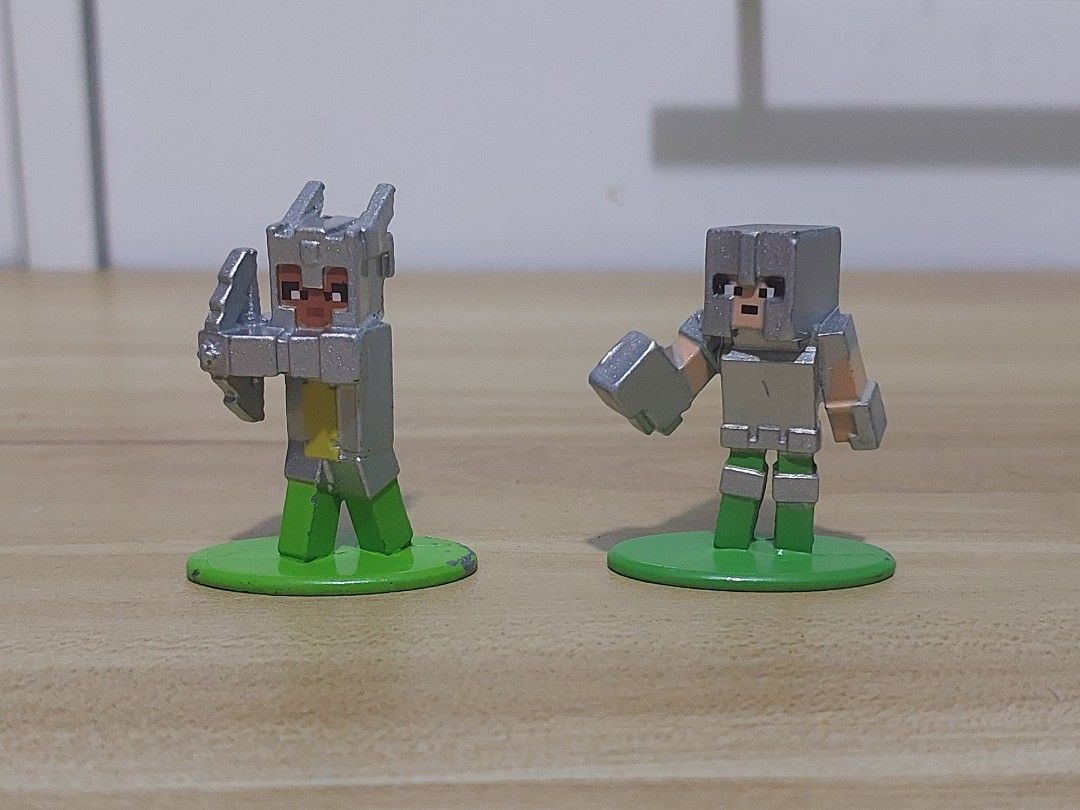Minecraft Die-Cast Metal Collectible Figures Bundle (Category: Designer & Blind Box Toys) located in Quezon City. Submitted by pandajack0910.1 (Listing ID 1468562932, Image 3). Description: - Set of miniature Minecraft character figures with colorful display bases - Includes mobs, villagers, and armored players in blocky pixelated style - Made of solid metal with detailed painted finishes - Perfect desk ornaments or additions to any Minecraft col