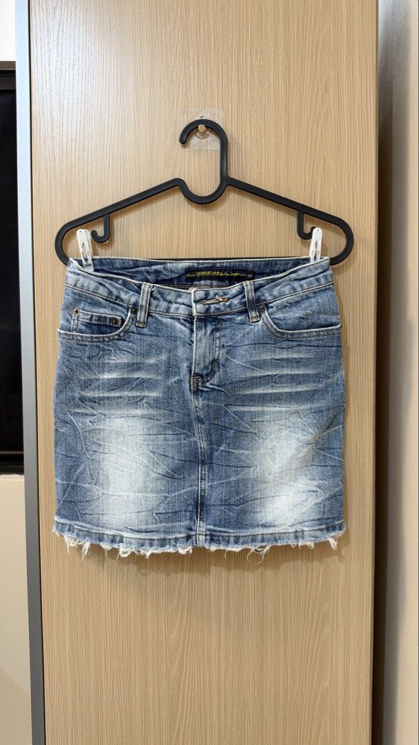 Mini Denim Skirt (Category: Skirts) located in Quezon City. Submitted by declutterw_v (Listing ID 1468681713, Image 1). Description: - Brand: Fantastic & Forever Info Jeans - Size: Small - Wash: Light wash denim with faded whiskering details - Design: Classic five-pocket style with front zipper and button closure - Hem: Trendy raw frayed hem.