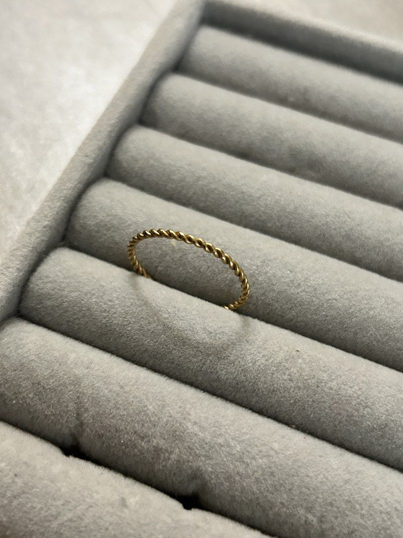 Minimalist Gold Twisted Band Ring (Category: Rings) located in Manila. Submitted by elonlineshop (Listing ID 1468519524, Image 3). Description: - Gold-toned twisted rope design - Simple, delicate, and minimalist style - Perfect for stacking or wearing solo - Ideal everyday jewelry piece Sizes Available: 16- 3pcs 17- 3pcs 18- 3pcs 19- 2pcs .