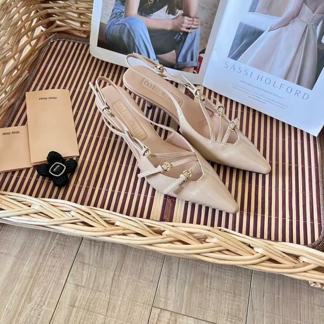 Miu Miu Nude Patent Slingback Heels (Category: Heels) located in Malabon City. Submitted by ojaswibent53454 (Listing ID 1468558241, Image 3). Description: - Style: Nude patent slingback heels with pointed toe - Heel: Comfortable mid kitten heel design - Details: Multiple buckled strap accents - Inclusions: Branded packaging tags and black flower charm accessory - Condition: Brand new / Excellent condition - Perfect for: Office wear, events, and c