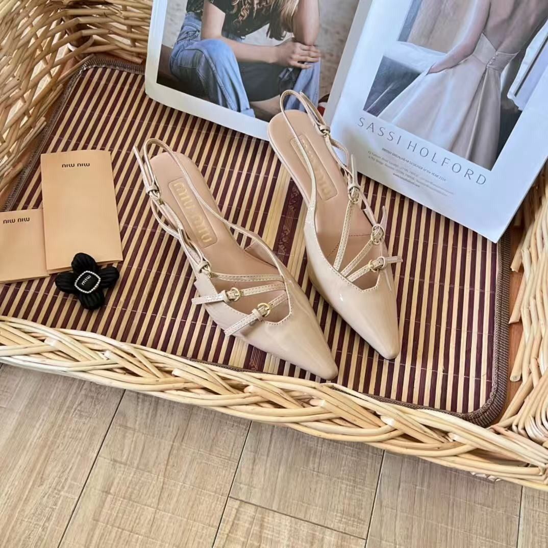 Miu Miu Nude Patent Slingback Heels (Category: Heels) located in Malabon City. Submitted by ojaswibent53454 (Listing ID 1468558241, Image 1). Description: - Style: Nude patent slingback heels with pointed toe - Heel: Comfortable mid kitten heel design - Details: Multiple buckled strap accents - Inclusions: Branded packaging tags and black flower charm accessory - Condition: Brand new / Excellent condition - Perfect for: Office wear, events, and c