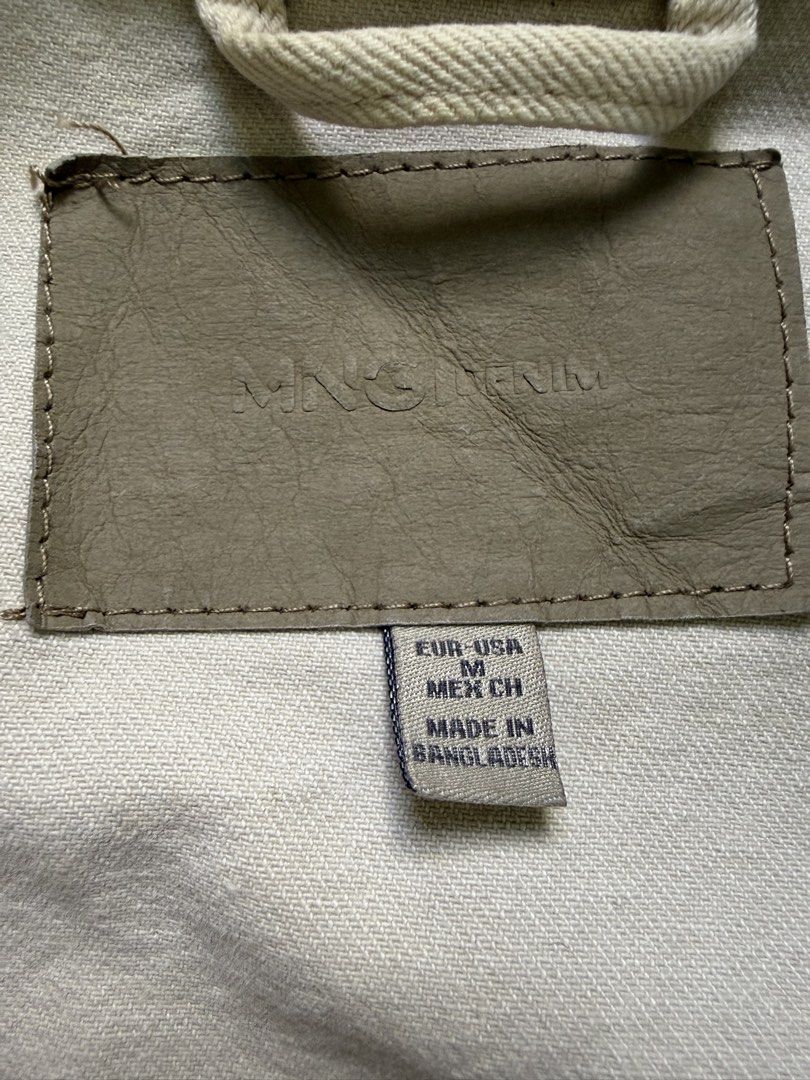 MNG Denim Off-White Denim Jacket Size M (Category: Coats, Jackets and Outerwear) located in Pasay City. Submitted by el.sole (Listing ID 1468570500, Image 2). Description: - Brand: MNG Denim - Color: Off-white - Size: M - Features: Classic structured fit, metal button closures on front, cuffs, and chest pockets - Style: Versatile, easy layering piece for year-round wear Please manage your expectations. Kindly expect signs of use and slightly fade