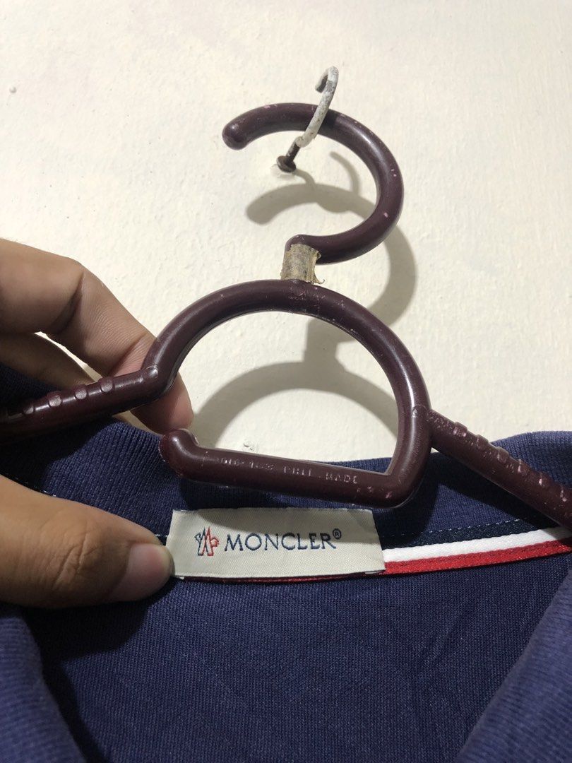 Moncler Polo Shirt (Category: Tshirts & Polo Shirts ) located in Manila. Submitted by raremountain00 (Listing ID 1468686803, Image 3). Description: Authentic Excellent condition Issue minimal rans check last picture.