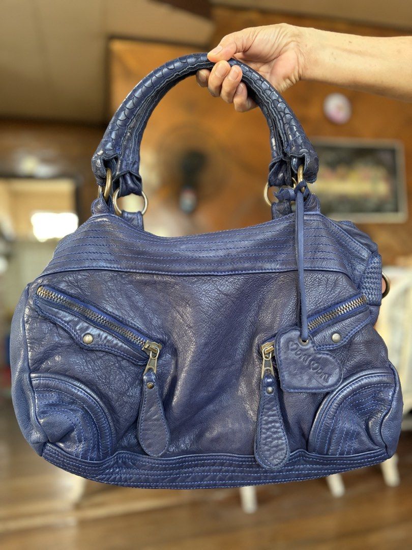 MoniMoni Made in Italy (Category: Luxury Bags & Wallets) located in Roxas City. Submitted by rglnos (Listing ID 1468546673, Image 1). Description: Preloved with plenty of life left! Has a minor inner rip, but overall all goods and ready to use. ✨.