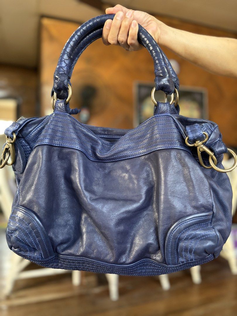 MoniMoni Made in Italy (Category: Luxury Bags & Wallets) located in Roxas City. Submitted by rglnos (Listing ID 1468546673, Image 3). Description: Preloved with plenty of life left! Has a minor inner rip, but overall all goods and ready to use. ✨.