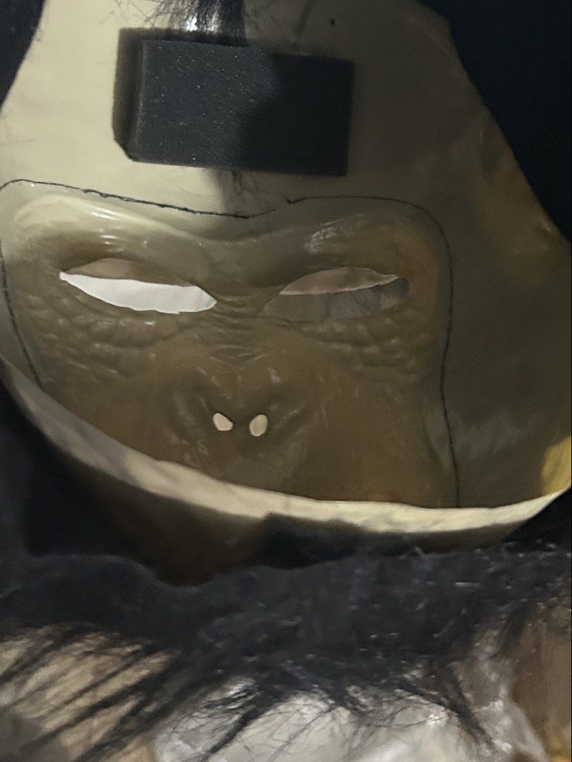 Monkey Chimp Gorilla Mask Costume Full Head Hair (Category: Coats, Jackets and Outerwear) located in Paranaque City. Submitted by zac.sei (Listing ID 1468583391, Image 3). Description: - Realistic ape mask with detailed sculpted face and skin texture - Thick black faux fur covering the back and sides - Built-in eye cutouts for clear visibility - Foam padding on the forehead for comfortable wear - Perfect for costume parties, Halloween, and events