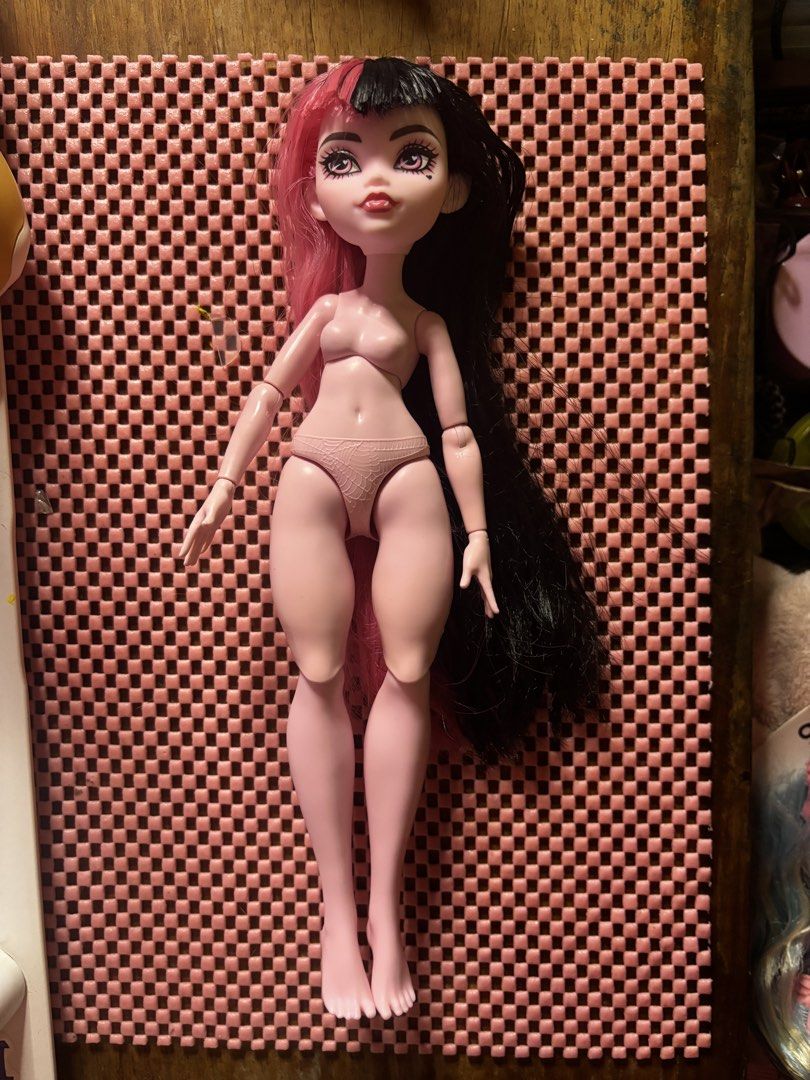 Monster High G3 Nude Draculaura Doll (Category: Kids Toys) located in Andop. Submitted by fammie_frayyss (Listing ID 1468695244, Image 1). Description: - Monster High Generation 3 Draculaura doll (Mattel 2022, Made in Indonesia) - Features iconic pink and black split hair with bangs and pale pink skin - Note: Selling as NUDE (no clothes, shoes, or accessories included) - Ideal for doll customizers, restorers, or completing your collection - No fl