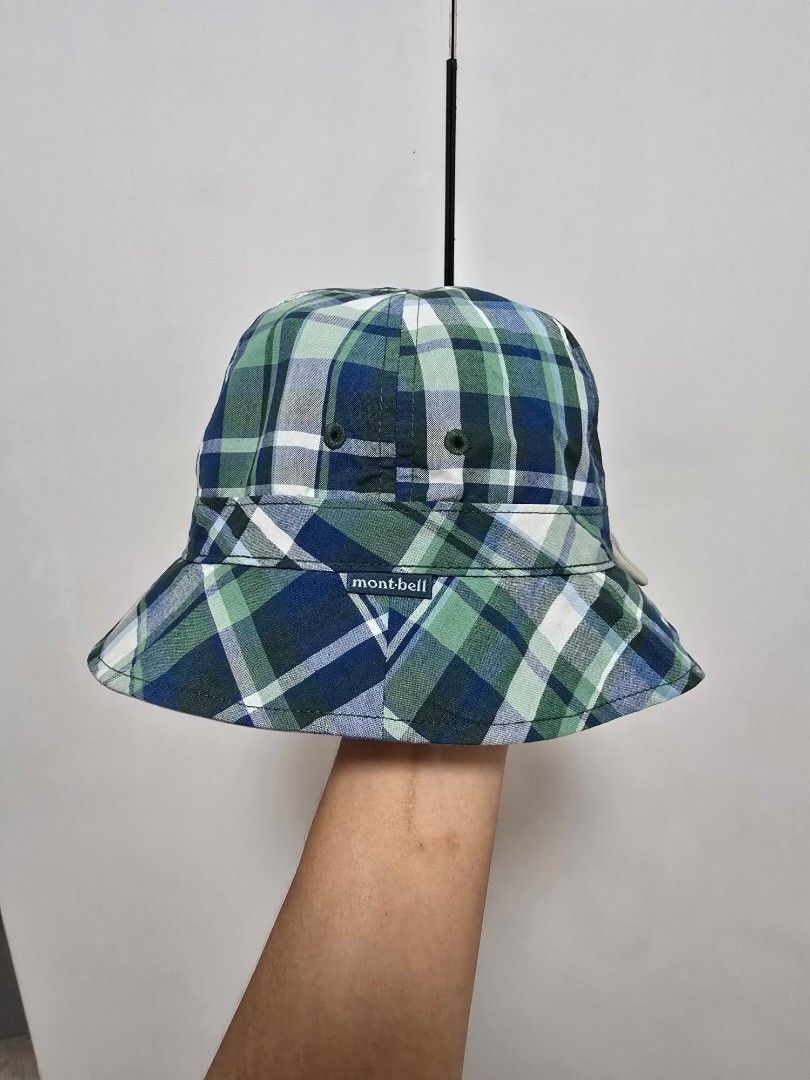 Mont-bell Reversible Toddler's Bucket Hat (Category: Babies & Kids Fashion) located in Pasig City. Submitted by jam1ekow (Listing ID 1468546987, Image 3). Description: reversible with inner adjustble strap light stain but not obvious due to storage in d cabinet.