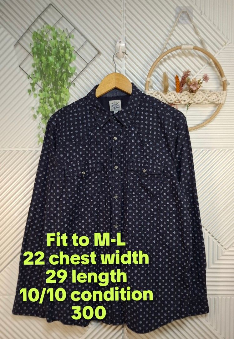 Moon Shine Long Sleeve Button-Up Shirt (Category: Sets & Coordinates) located in Bulacan. Submitted by cathycampo51092 (Listing ID 1468616682, Image 2). Description: Moon Shine button-up shirt in navy blue with an all-over geometric dot pattern. Long sleeves, dual chest pockets with snap buttons, and snap closures down the front. Size M to L. Measurements: 22 inches chest width, 29 inches length. Clean pattern, easy to style for casual days..