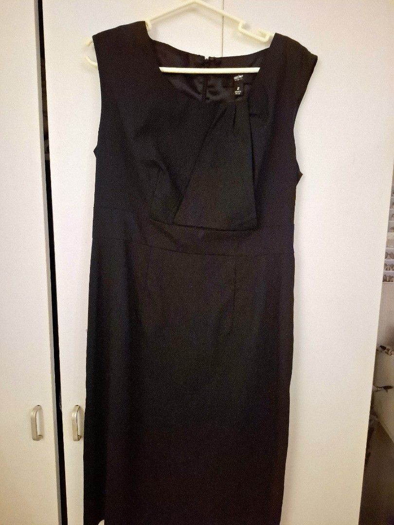 Mossimo Black Dress Size 2 (Category: Dresses) located in Tanza. Submitted by jajangmyeonnn (Listing ID 1468594406, Image 1). Description: - Brand: Mossimo - Color: Solid black - Size: 2 - Style: Sleeveless with an asymmetrical neckline fold and back zipper - Condition: Clean overall look with minimal wear on fabric - Origin: Made in China.