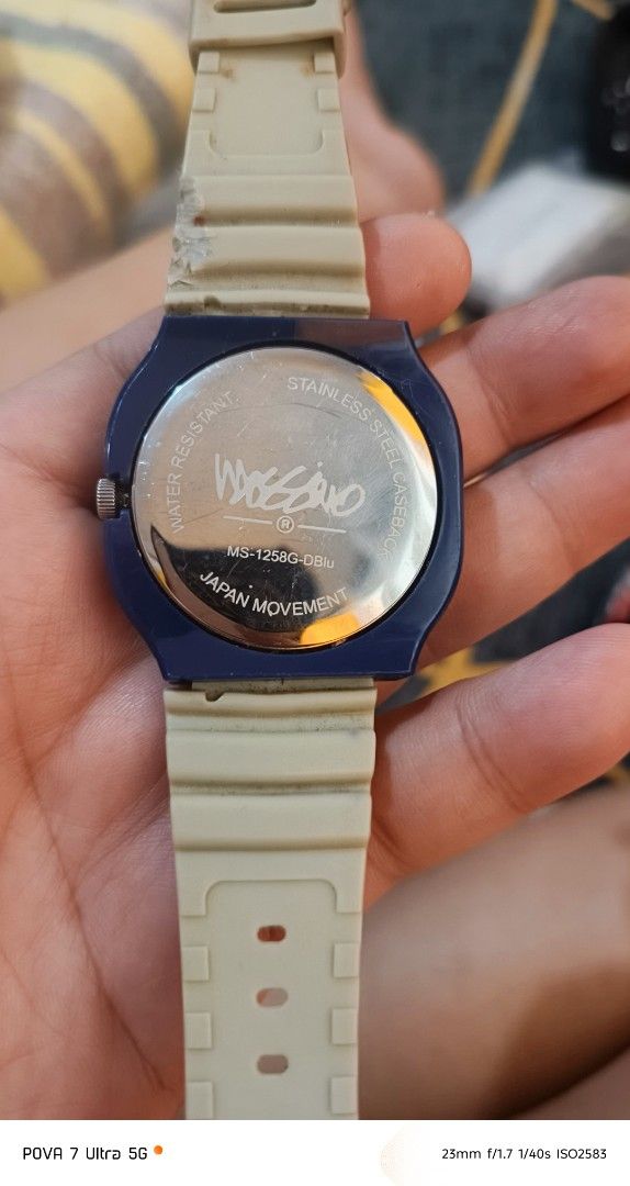 Mossimo casual watch (Category: Men's Watches) located in Quezon City. Submitted by junseller18 (Listing ID 1468547199, Image 3). Description: Everyone! Nag-declutter ako at ibinebentang mura itong authentic Mossimo casual watch ko (Model: MS-1258G-DBlu). May blue bezel at cream/beige rubber strap siya, ang ganda ng color combi, pwedeng-pwedeng pang-araw-araw! Japan movement at stainless steel caseback pa siya. May konting signs of use na pero gu