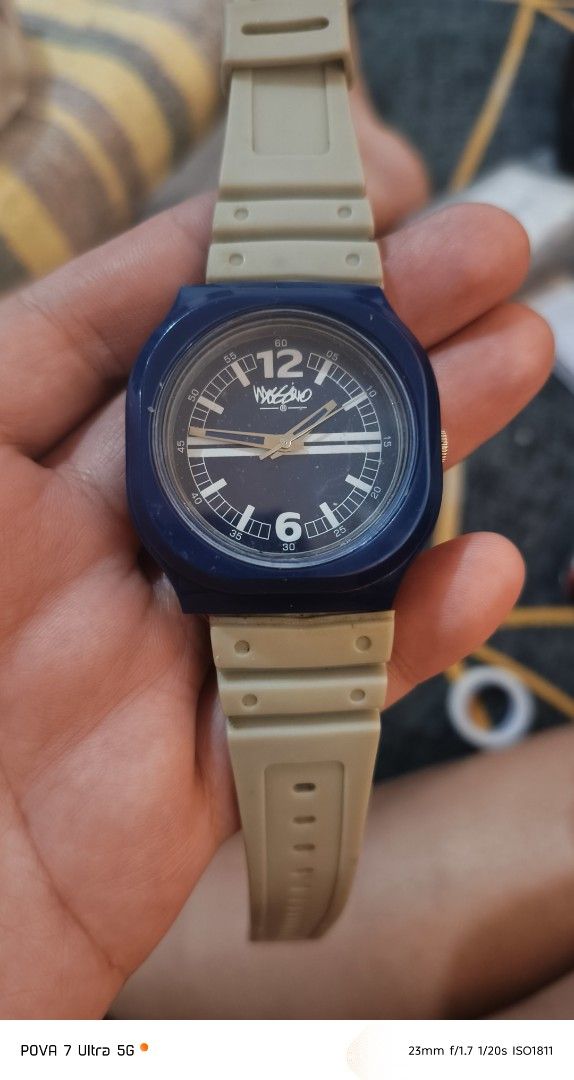 Mossimo casual watch (Category: Men's Watches) located in Quezon City. Submitted by junseller18 (Listing ID 1468547199, Image 1). Description: Everyone! Nag-declutter ako at ibinebentang mura itong authentic Mossimo casual watch ko (Model: MS-1258G-DBlu). May blue bezel at cream/beige rubber strap siya, ang ganda ng color combi, pwedeng-pwedeng pang-araw-araw! Japan movement at stainless steel caseback pa siya. May konting signs of use na pero gu
