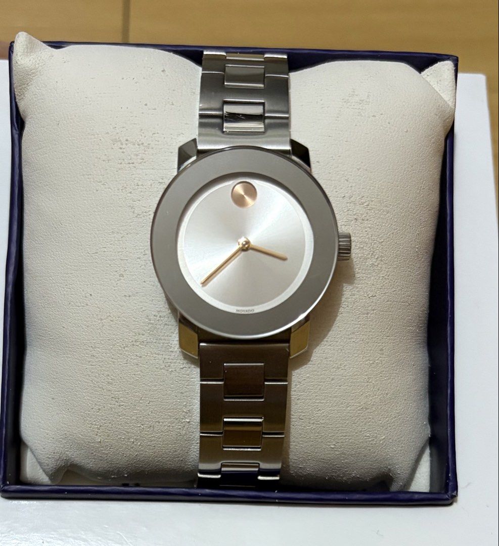 Movado Bold Silver Dial Ladies Watch (Category: Women's Watches) located in Quezon City. Submitted by beckyshop2024 (Listing ID 1468588628, Image 3). Description: - Used twice - In mint condition - 30mm; Stainless steel; 30m water resistant; Scratch resistant K1 Mineral; Swiss movement - Silver-toned metallic sunray dial with a signature rose-gold-toned flat dot at 12 o'clock and matching rose-gold hands - Note: Few scratches on the side (refer t