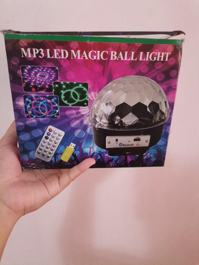 MP3 LED Magic Ball Light with Bluetooth (Category: Lighting) located in Makati City. Submitted by kookybearsstuff (Listing ID 1468569027, Image 2). Description: - MP3 LED magic ball light for parties and room setups - Projects colorful rotating light patterns on walls and ceilings - Built-in Bluetooth connectivity, USB port - Creates instant fun club vibes at home - Tested and working - Comes in original box - no remote.