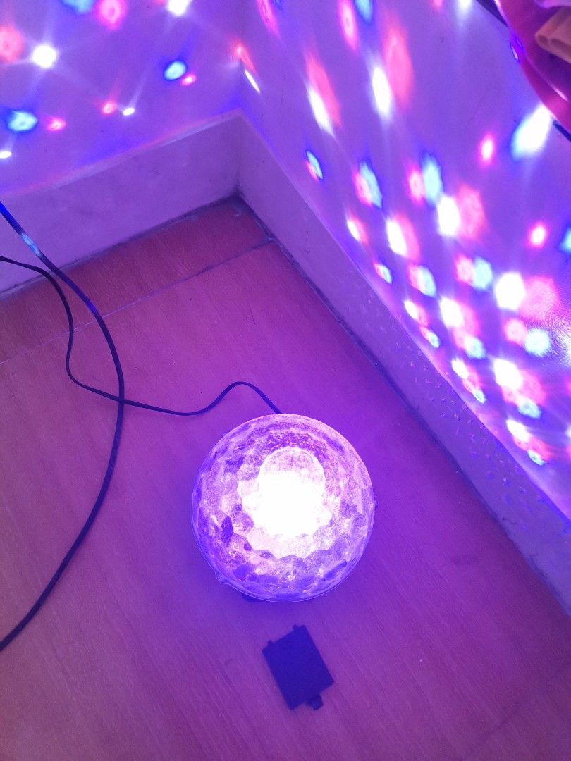 MP3 LED Magic Ball Light with Bluetooth (Category: Lighting) located in Makati City. Submitted by kookybearsstuff (Listing ID 1468569027, Image 3). Description: - MP3 LED magic ball light for parties and room setups - Projects colorful rotating light patterns on walls and ceilings - Built-in Bluetooth connectivity, USB port - Creates instant fun club vibes at home - Tested and working - Comes in original box - no remote.