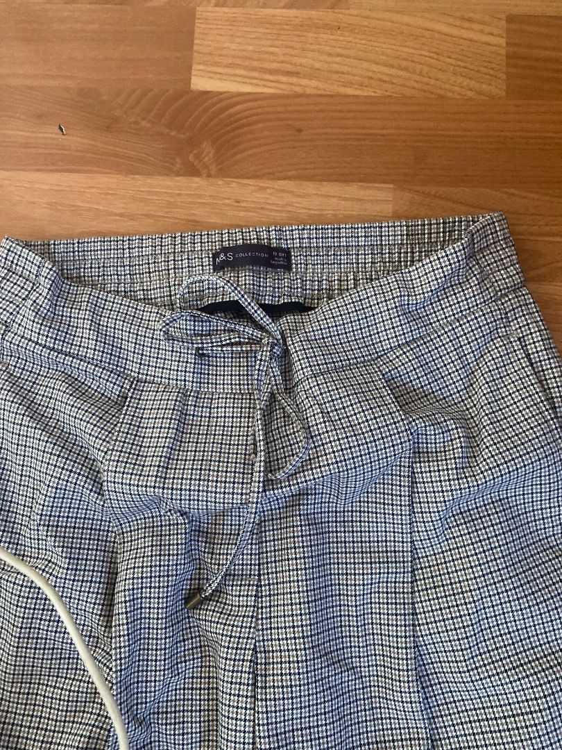 M&S Collection Checked Drawstring Trousers (Category: Trousers) located in Manila. Submitted by franzboots95 (Listing ID 1468711407, Image 1). Description: - Brand: Marks & Spencer Collection - Design: Classic blue and white check pattern with front pleats - Waist: Elasticated waist with adjustable matching drawstring tie - Fit: Straight fit through the legs - Comfort: Lightweight fabric, perfect for daily wear - Condition: Clean tag inside.