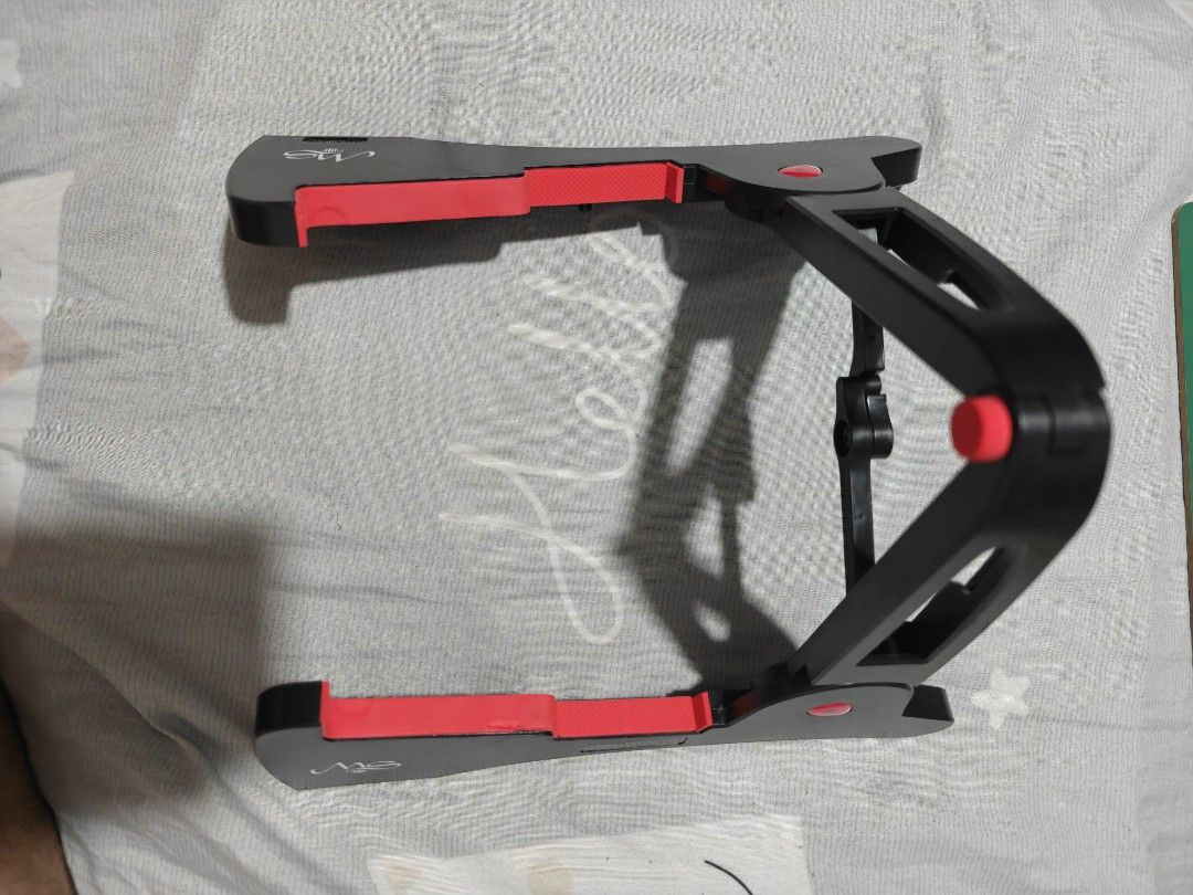 MS Portable Folding Guitar Stand (Category: Musical Instruments) located in Caloocan City. Submitted by mackenzie001 (Listing ID 1468667829, Image 3). Description: - Portable folding guitar stand in stylish black and red - Features the MS brand logo stamped on the side - Folds completely flat for hassle-free storage and transport - Equipped with rubber padding to protect your instrument from scratches - Solid and reliable build suitable for both 