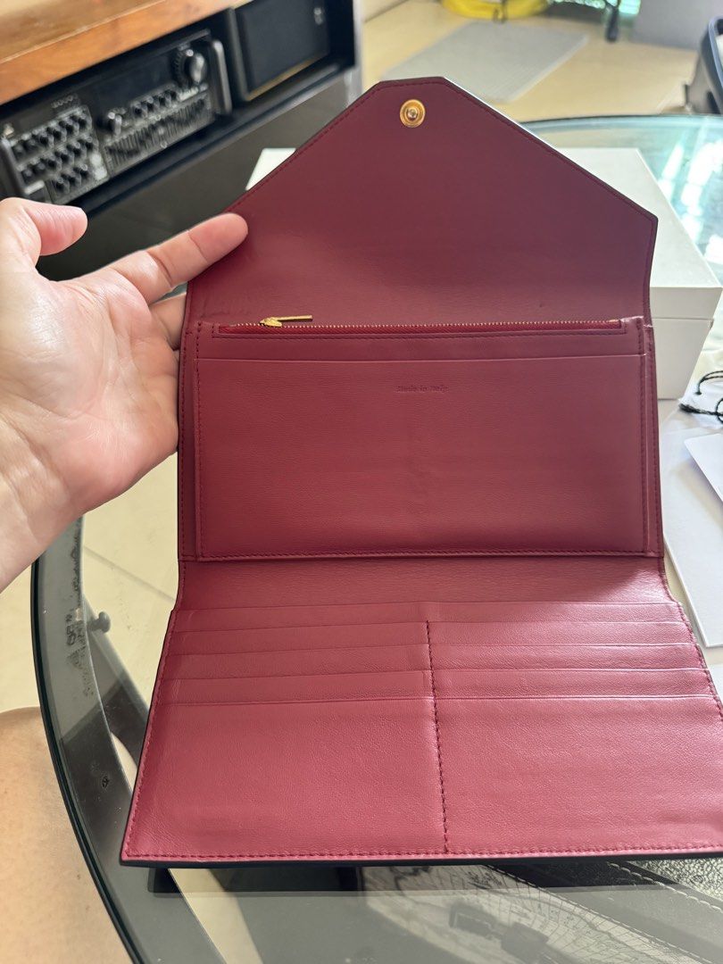 Multi colored wallet (Category: Purses & Pouches) located in Manila. Submitted by supermommm (Listing ID 1468661556, Image 2). Description: Complete with box, dustbag and tags Authentic .