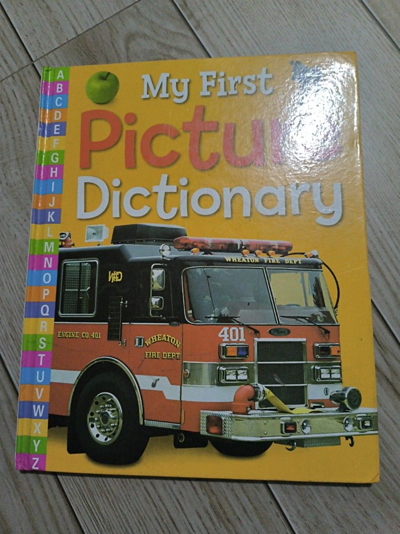 My First Picture Dictionary by Sarah Phillips (Category: Children's Books) located in Manila. Submitted by chayieinkie (Listing ID 1468707050, Image 1). Description: - Title: My First Picture Dictionary by Sarah Phillips - Publisher: Castle Street Press - Format: Hardcover with colorful illustrations - Features: Handy alphabet tabs on the side for easy navigation - Age Range: Recommended for kids 5 years and up - Benefits: Perfect for learning ba