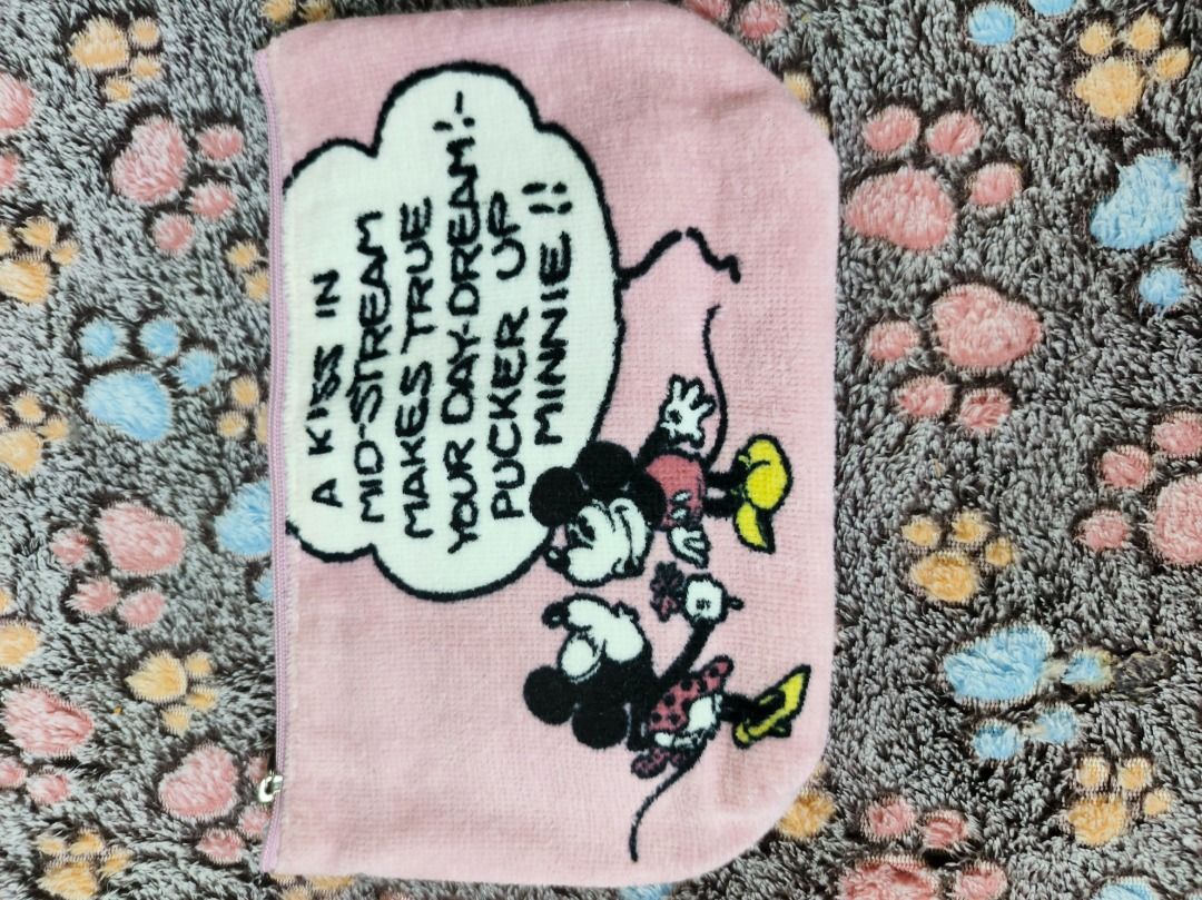 Nano Universe Mickey Mouse Pink Pouch (Category: Purses & Pouches) located in San Leonardo. Submitted by burgossanleonardo.12345 (Listing ID 1468648278, Image 2). Description: - Authentic Nano Universe pouch - Color: Pink front, off-white canvas back - Cute Mickey & Minnie graphic with vintage quote - Printed Nano Universe logo on the back - Dimensions: approx. 14 cm (H) x 23 cm (W) - Secure top zip closure.