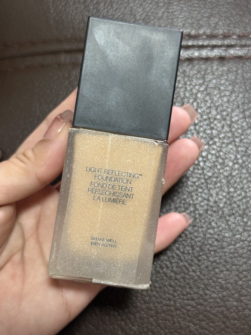 NARS Light Reflecting Foundation Patagonia Medium 1.2 (Category: Makeup) located in Malabon City. Submitted by prelovedbychee16 (Listing ID 1468518591, Image 3). Description: - Brand: NARS - Product: Light Reflecting Foundation - Shade: Patagonia (Medium 1.2) - Size: Standard 30ml / 1 Fl. Oz - Packaging: Full coverage bottle with convenient pump top under the black cap - Formula: Vegan, blurs imperfections, and improves skin clarity over time Rea